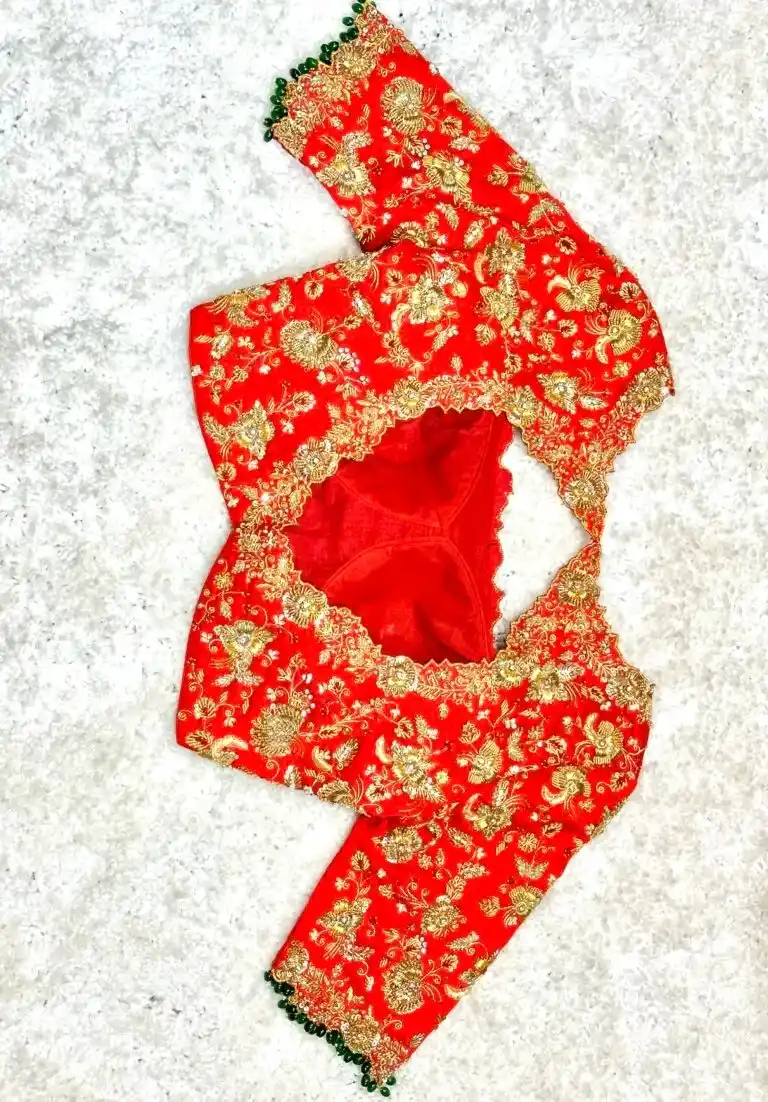 Muhurtham blouse with floral zardosi design
Blouses, Bridal Blouses