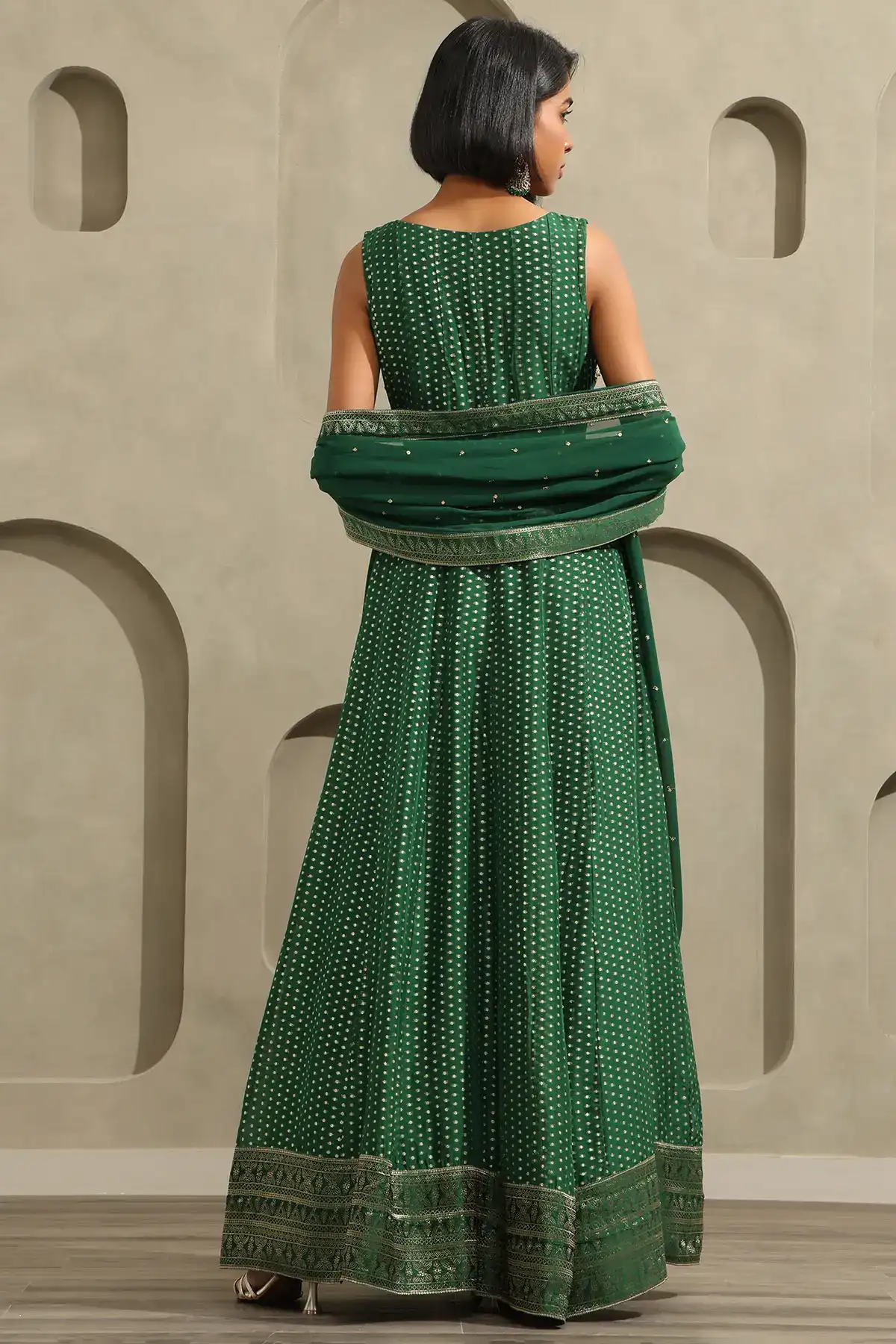 Green Georgette Zari Woven Gown With Beads And Stones