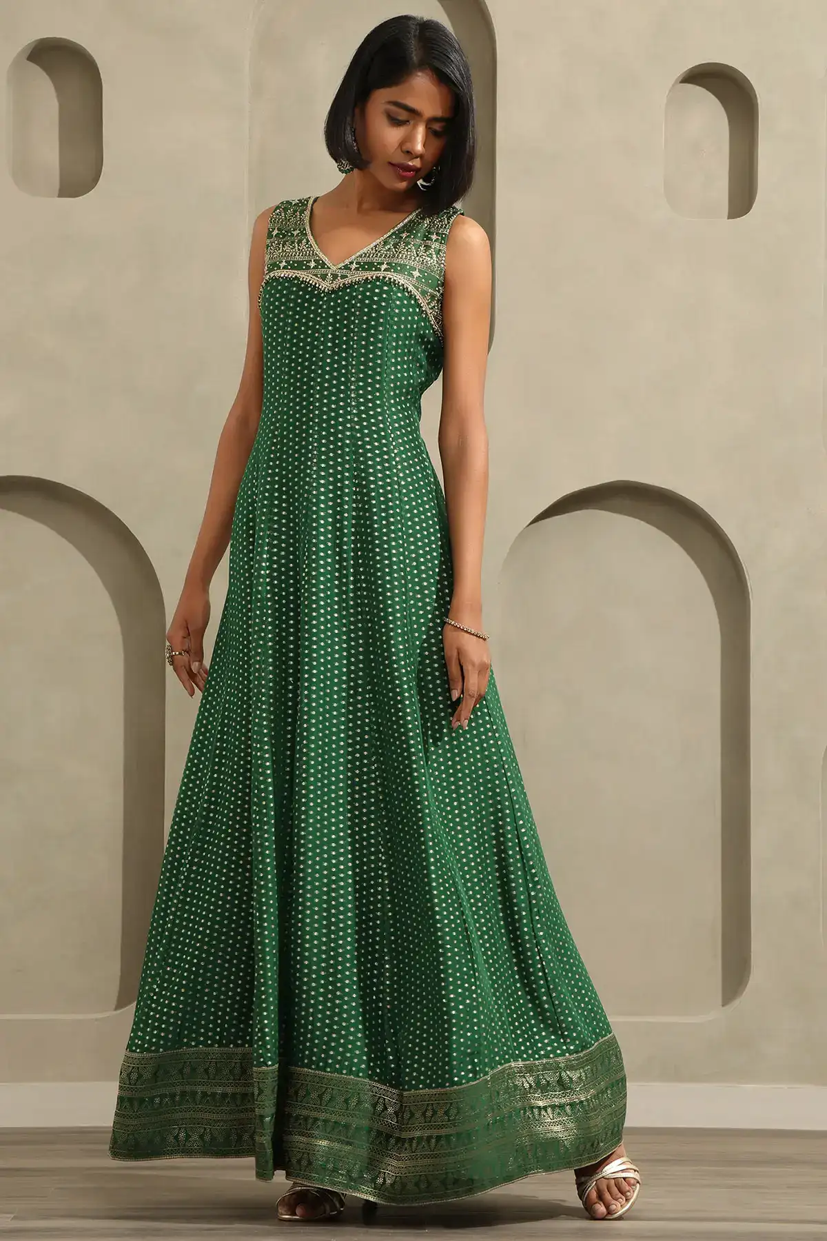 Green Georgette Zari Woven Gown With Beads And Stones
