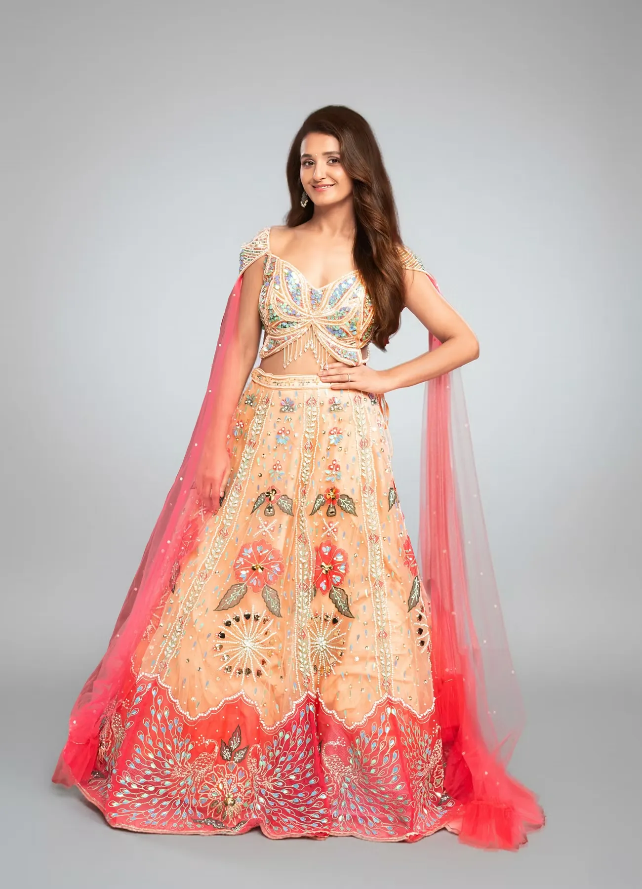 Peach Net Hand Embroidered Off-Shoulder Lehenga